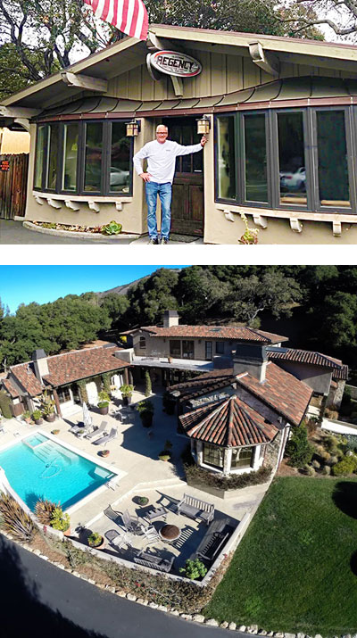 Aerial view of a home with tiled roofs, a pool and a lawn